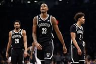 Nic Claxton with Cam Johnson and Spencer Dinwiddie of the Brooklyn Nets